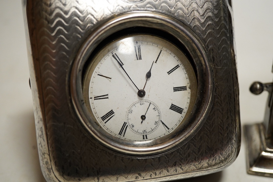 An Edwardian silver perpetual desk calendar, Birmingham, 1907, E F Braham, initalled, (mechanism a/f) together with an engine turned propelling pencil and a Swiss open faced poclet watch contained within a silver faced l